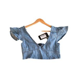 Mid wash flared sleeve crop top